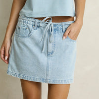 RHYTHM CHARLIE LOW RISE MINI SKIRT - LIGHT WASH